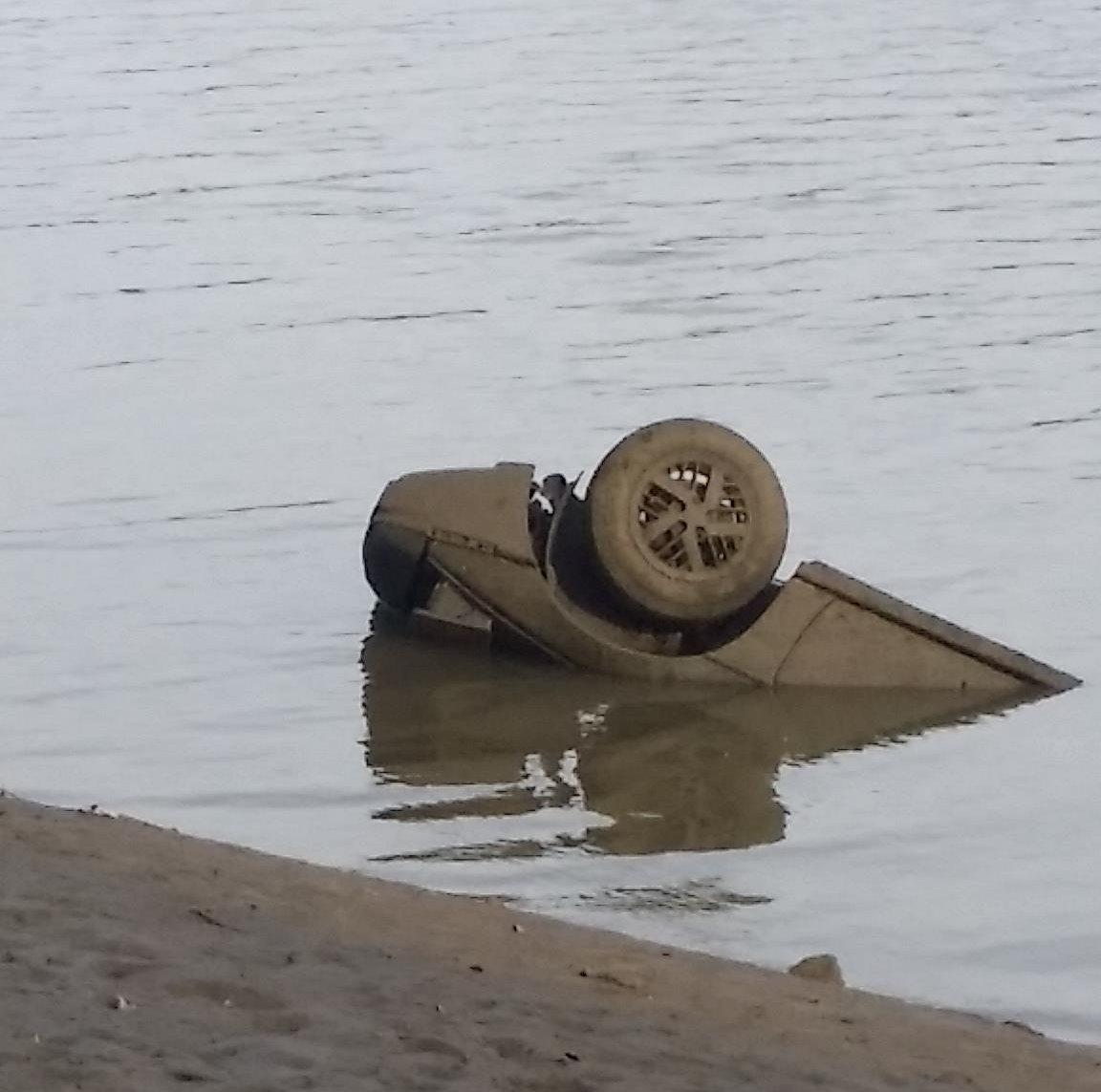 Partially submerged car in Kearsley Lake